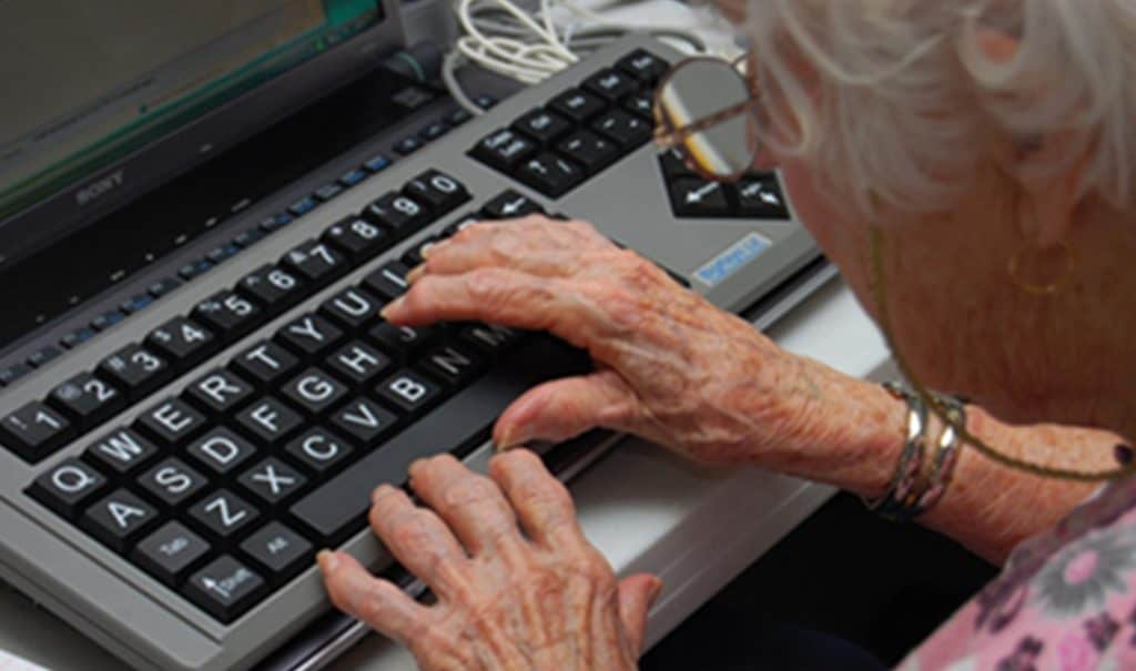 elderly typing bigkeys keyboard